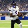 Number 8 Lamar Jackson runs into the endzone carrying the football during Week 1's opener.