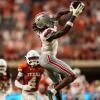 Ohio State Buckeyes wide receiver Jeremiah Smith (4) catches a pass during the NCAA football game against the Texas Longhorns at