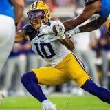 LSU safety Dashawn Spears (10) attempts to make a tackle while lunging during a college football game between Ole Miss and LSU