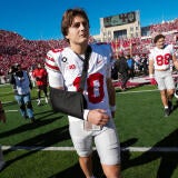 Ohio State Buckeyes quarterback Julian Sayin (10) returns to the field in a sling during the NCAA football game against the