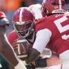 Tennessee linebacker Jeremiah Telander (22) sacks Alabama quarterback Keelon Russell (12) during a game between Tennessee and