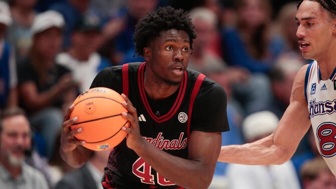2026-10-22t014623z-1810053391-mt1usatoday30148916-rtrmadp-3-louisville-cardinals-forward-flory-bidunga-40-looks-for-an-1.jpg