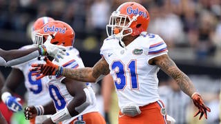 Detroit Lions cornerback Teez Tabor #31 runs the ball against New