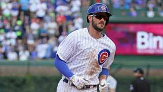 Chicago Cubs Anthony Rizzo (L), Kris Bryant (C), and Mike