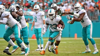 Miami Dolphins running back Jay Ajayi, left, and quarterback Jay