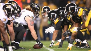 Pittsburgh Steelers quarterback Ben Roethlisberger (7) walks off the field  holding the jersey of linebacker Ryan Shazier after beating the Baltimore  Ravens 39-38 to clinch the AFC North Championship in an NFL