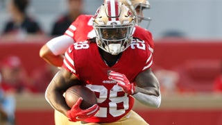 Running back Jerick McKinnon practices for 49ers