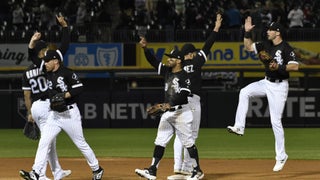 A cameraman gets an unintentional close up of a wayward opening pitch