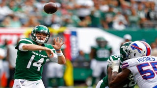 New York Jets quarterback Sam Darnold (14) is stopped in the second half of  an NFL