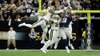 Dallas Cowboys quarterback Dak Prescott (4) alongside Tyron Smith