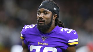 Minnesota Vikings running back Dalvin Cook walks on the field