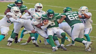 New York Jets safety Marcus Maye (20) intercepts a pass intended for Miami  Dolphins wide receiver Preston Williams (18) during an NFL football game,  Sunday, Oct. 18, 2020, in Miami Gardens, Fla. (