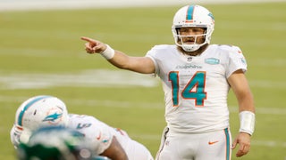 Scott Mitchell of the Miami Dolphins looks on before a NFL football News  Photo - Getty Images