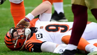 Top pick Burrow injures left knee, Washington beats Bengals