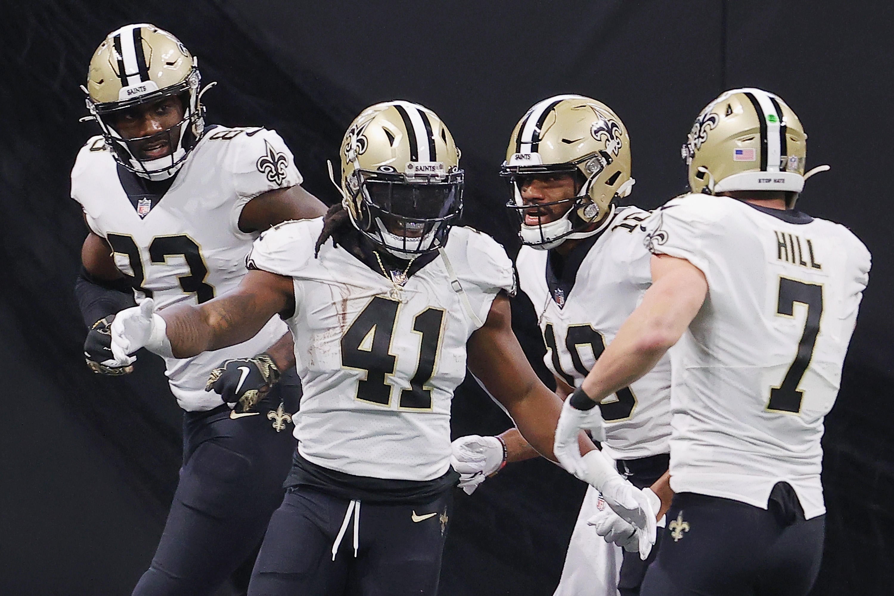 Taysom Hill of the New Orleans Saints rushes the ball in the first News  Photo - Getty Images