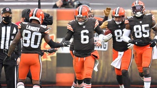 Myles Garrett speaks with Mason Rudolph after Browns win