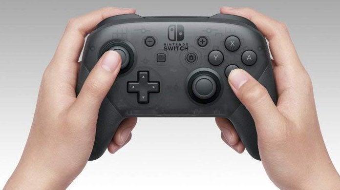 nintendo-switch-pro-controller-in-use-top-1155956.jpg