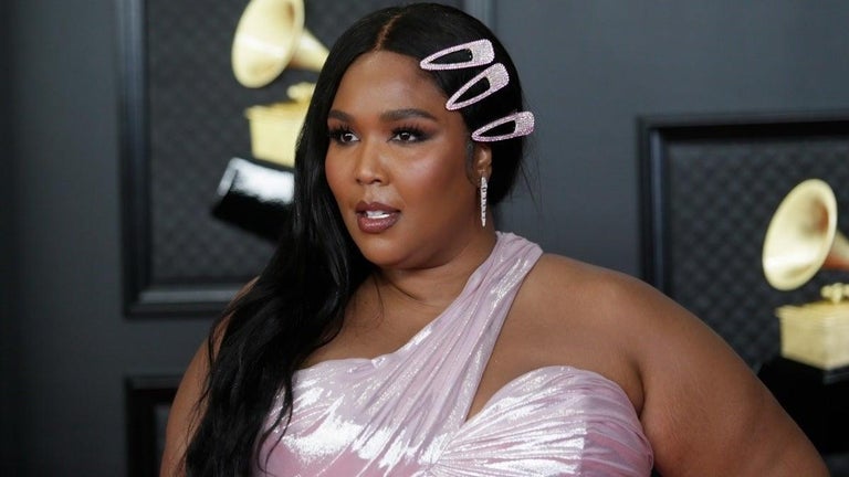 Lizzo Transforms Into the Ultimate 'Bad B--' Mrs. Grinch Ahead of Christmas