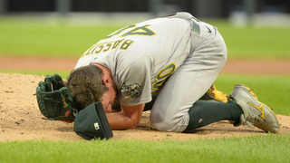 Baseball player out after hitting himself in the face with his bat in a fit  of rage