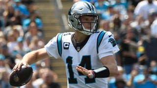 Carolina Panthers kicker Ryan Santoso wears a 9/11 FDNY hat during