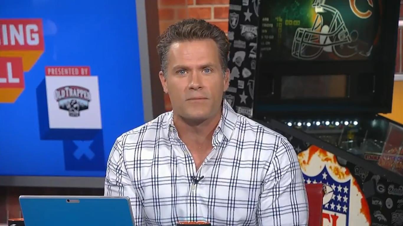 Good Morning Football host Kyle Brandt falls off chair on live TV