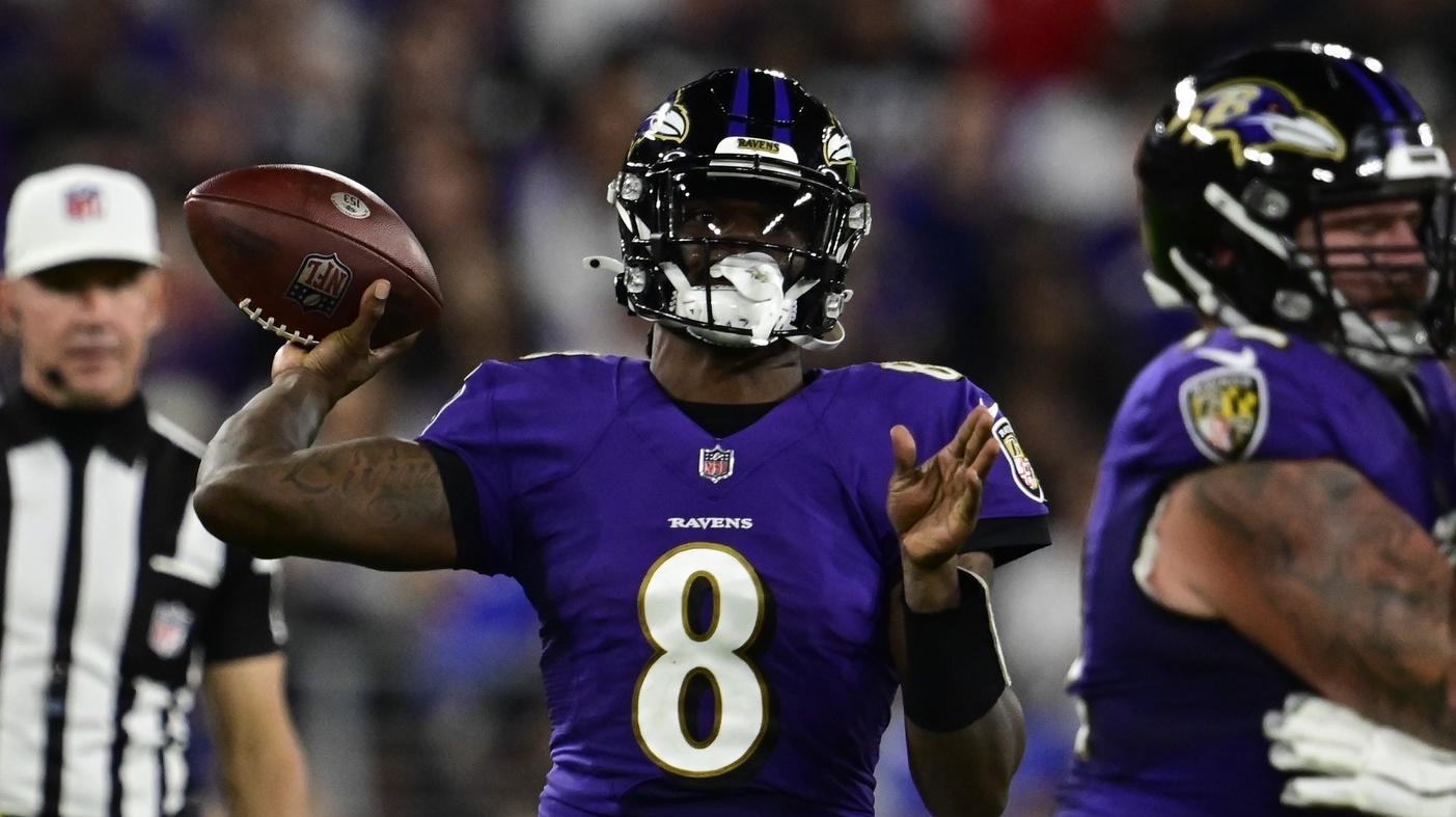 Baltimore Ravens quarterback Lamar Jackson (8) and wide receiver Marquise  Brown (5) warm up before an NFL football game against the Minnesota Vikings,  Sunday, Nov. 7, 2021, in Baltimore. (AP Photo/Nick Wass