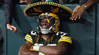 Aaron Jones of the Green Bay Packers celebrates with his teammates News  Photo - Getty Images