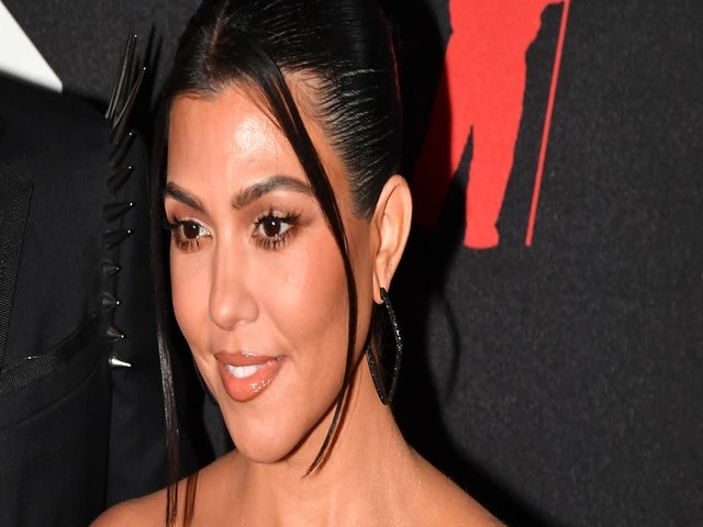 Kourtney Kardashian Facing Photoshop Accusations After Posting Disneyland Photo With Son