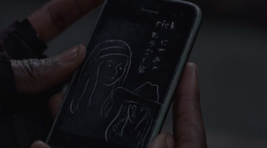 the-walking-dead-michonne-rick-phone.png the-walking-dead-michonne-rick-phone.png