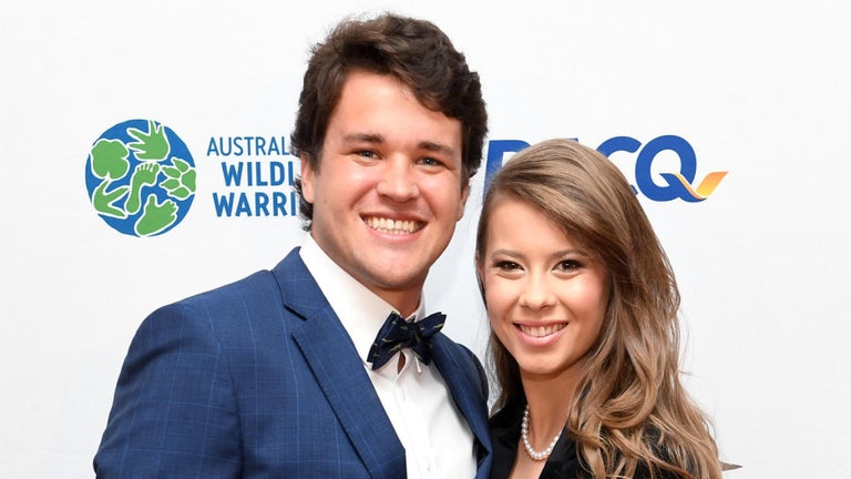 Bindi Irwin and Husband Chandler Powell Send Fans for Loop With Accents in New Video