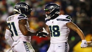 DK Metcalf of the Seattle Seahawks catches the ball for a touchdown News  Photo - Getty Images