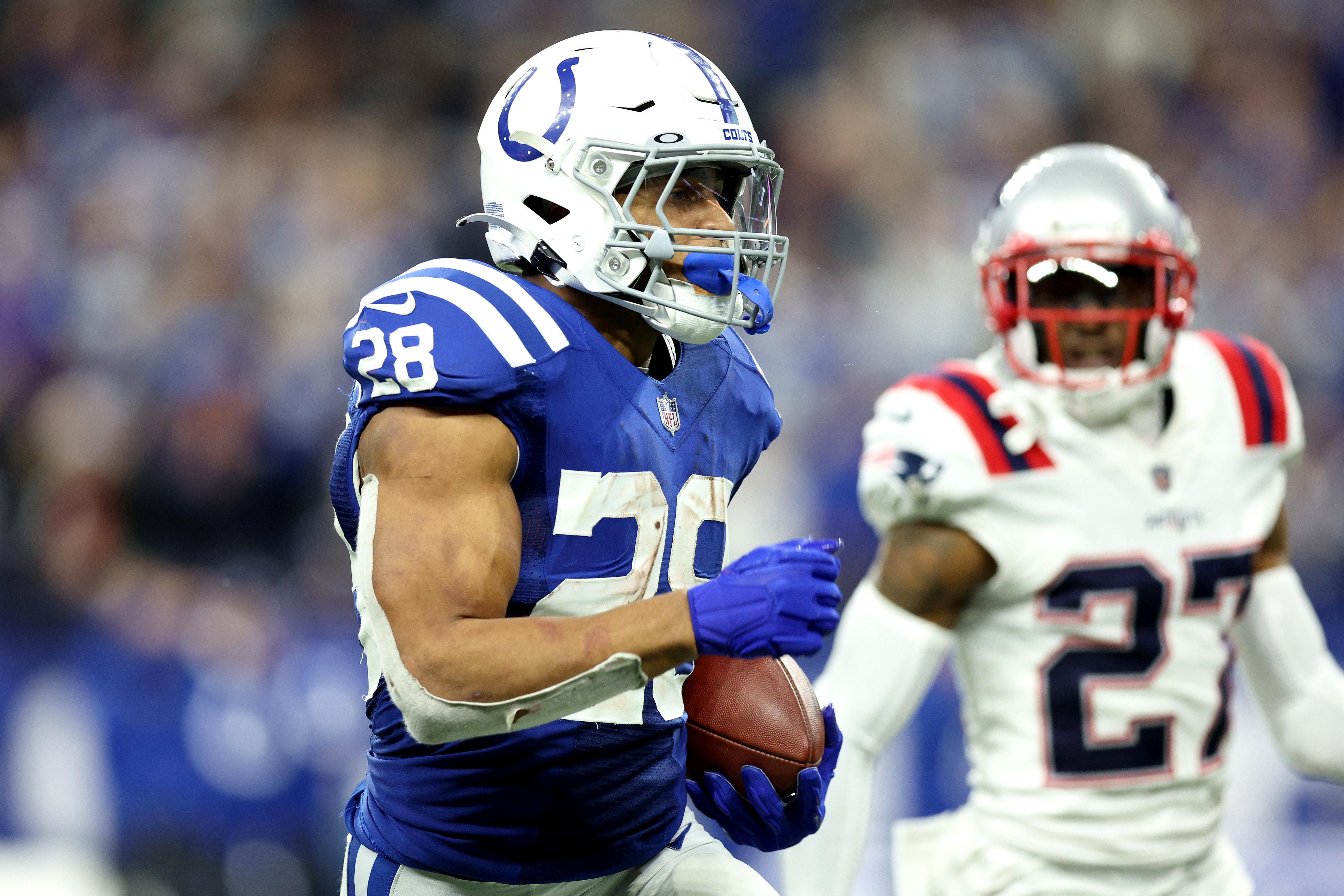 INDIANAPOLIS, IN - DECEMBER 18: Indianapolis Colts Linebacker Jordan  Glasgow (59) walks off the field at the conclusion of the NFL football game  between the New England Patriots and the Indianapolis Colts