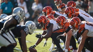 Bengals hold off Raiders for first playoff victory in 31 years