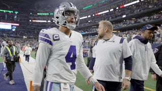 Dallas Cowboys quarterback Dak Prescott steps off the riser after