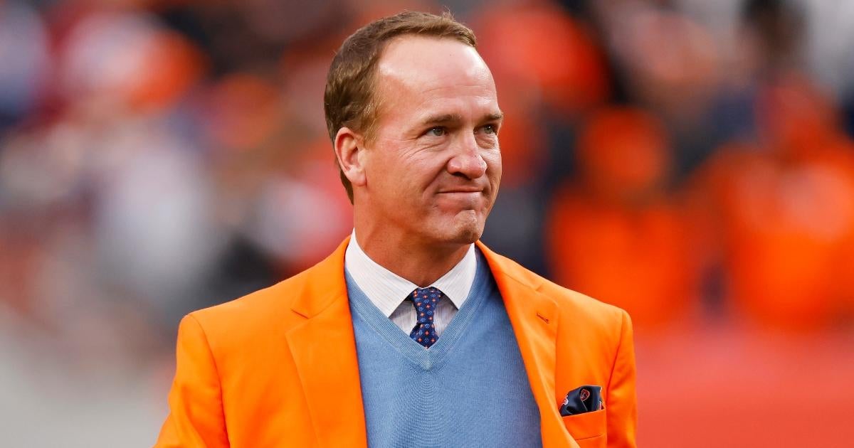 peyton-manning-caught-saying-curse-word-manning-cast-rams-cardinals-playoff-game.jpg