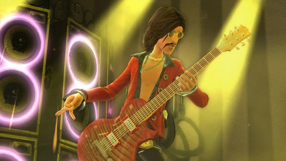 Guitar Hero' Creator Reveals Details of New Summer Game Release 'Rock Band  Blitz' (Q&A)