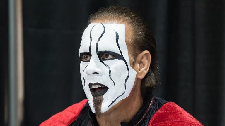AEW's Sting Jumps off Stage, Crashes Into Table at 62 Years Old