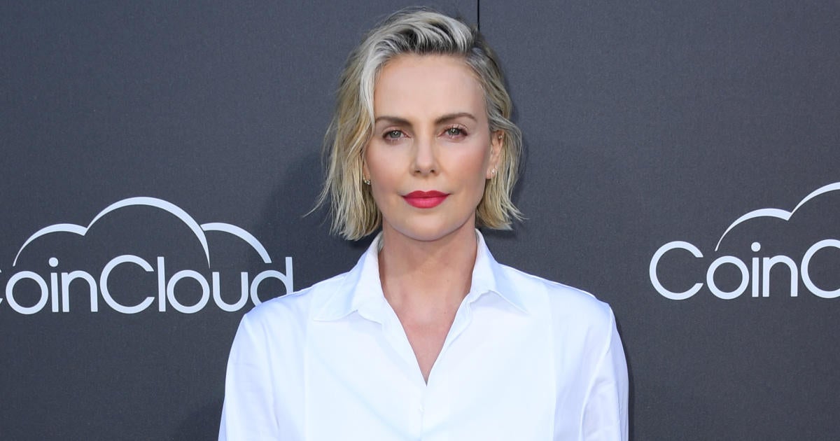 Charlize Theron Reveals The Identity Of Her Super Bowl 'Mystery