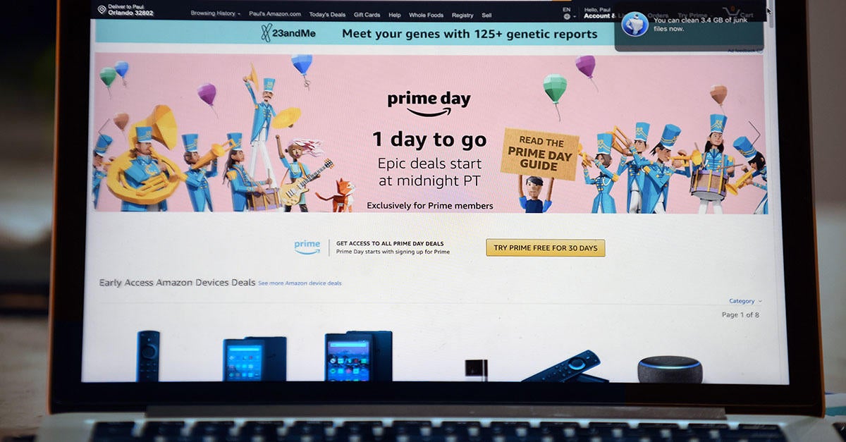 A computer screen shows Amazon Prime Day sales