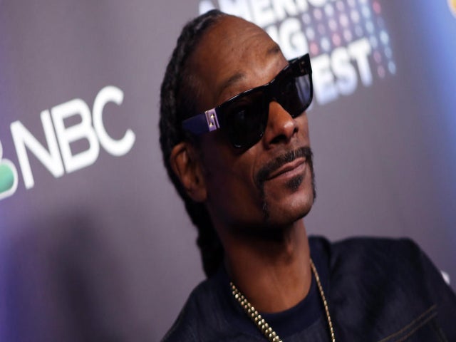 Snoop Dogg Finally Reveals What He Meant by 'Giving Up Smoke' — and It Isn't Weed