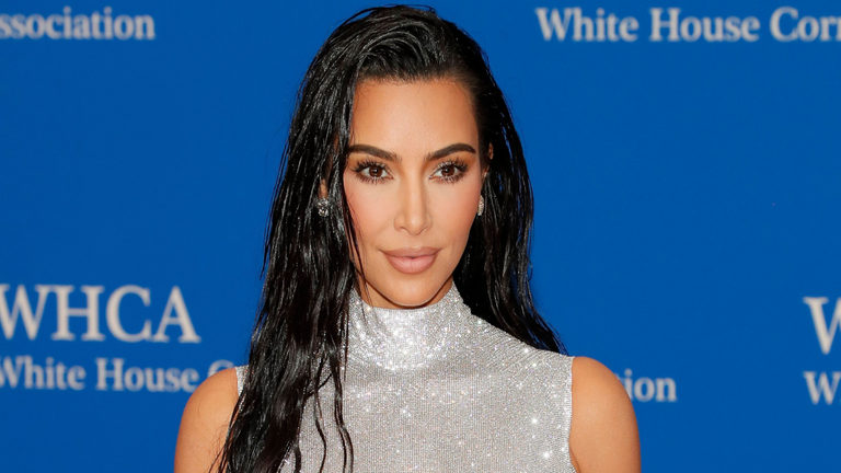 Kim Kardashian Shows off 'Painful' Stomach Tightening Treatment in New Photos
