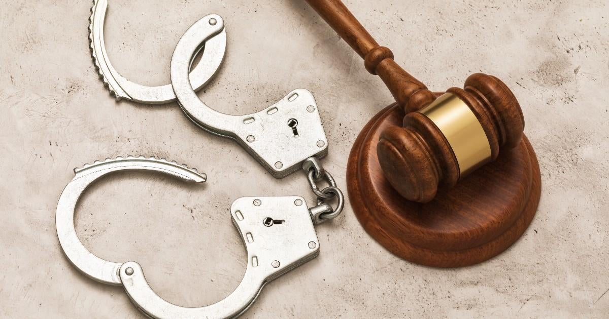 open-handcuffs-judge-gavel