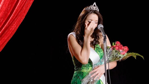 Hispanic beauty pageant winner crying on stage