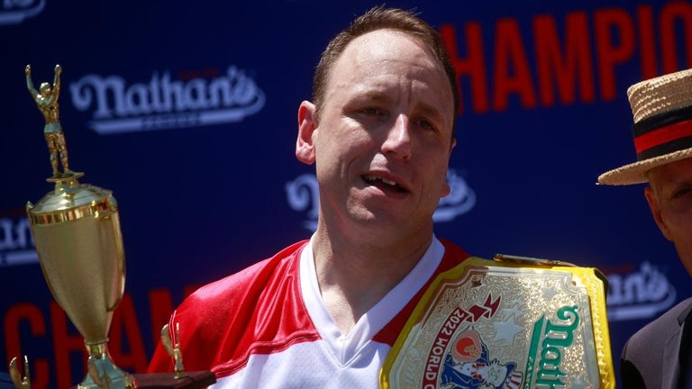 Joey Chestnut Chokes Protestor During Hot Dog Eating Contest