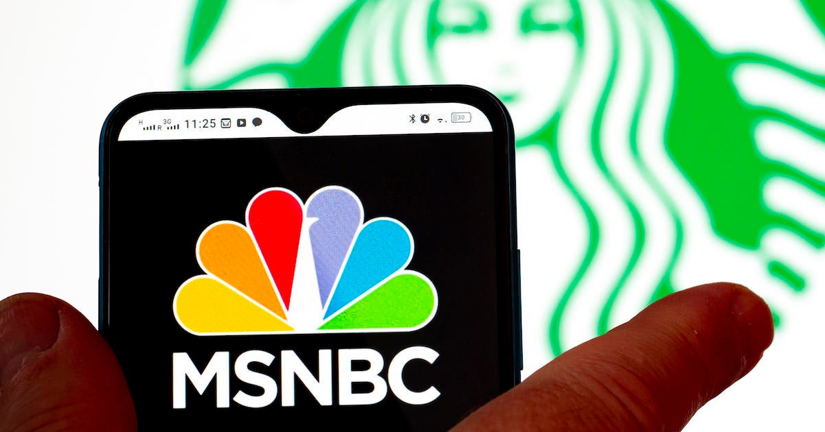 In this photo illustration, the MSNBC logo is seen displayed