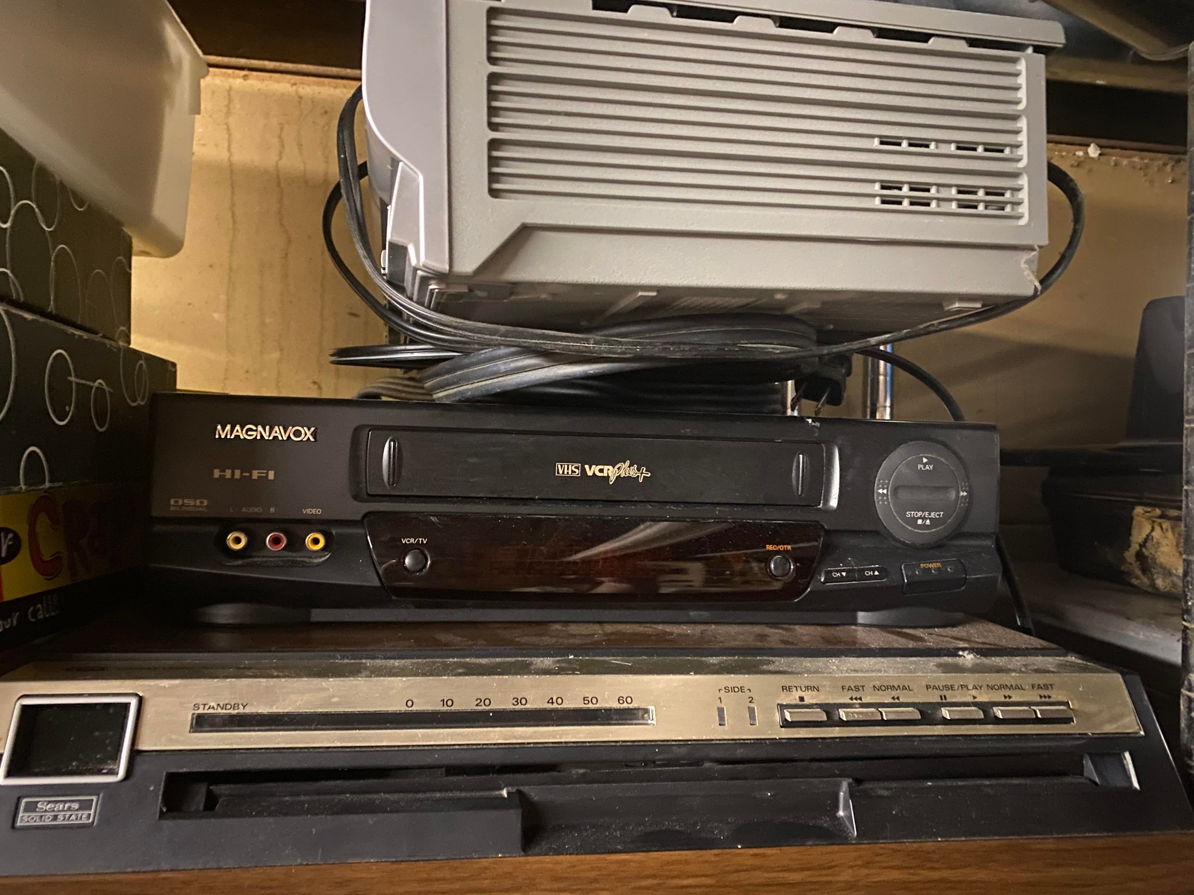 old-disc-and-vhs-players-in-a-garage