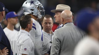 Dallas Cowboys quarterback Dak Prescott steps off the riser after