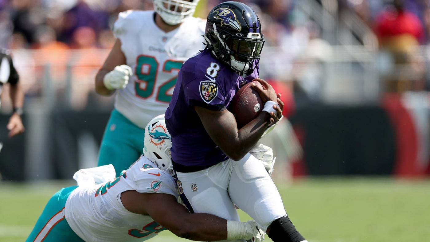 Lamar Jackson sets two NFL records in Ravens' wild, come-from-ahead loss to Dolphins