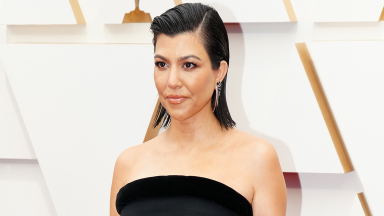 Kourtney Kardashian Claps Back at Pregnancy Comment While Posing in Lingerie