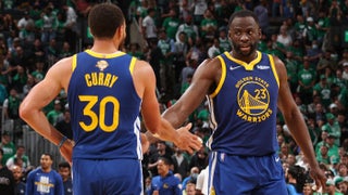 Photos: Warriors open NBA title defense against Lakers